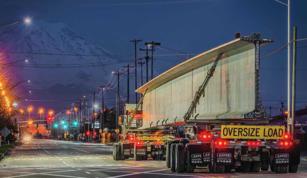 V Van Dyke truck carrying girder