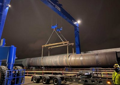 Loading pipe at night